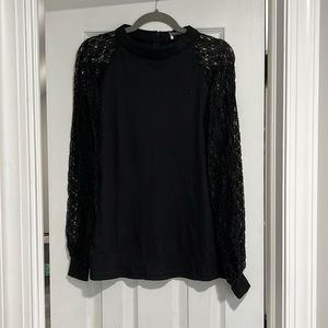 New never worn with tags. long sleeve shirt. Lace sleeves